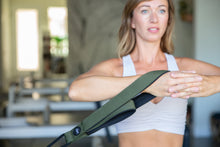 Load image into Gallery viewer, Reformer premium loops in use by a pilates professional