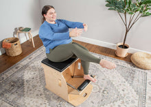 Load image into Gallery viewer, woman exercising on wunda chair