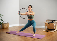 Load image into Gallery viewer, Balanced Body Flex Ring Toner with Handle Pads in use