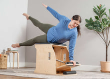Load image into Gallery viewer, plus size model exercising on wunda chair with pedal stopper
