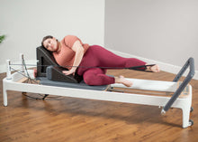 Load image into Gallery viewer, Plus size model exercising using pilates angle