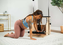 Load image into Gallery viewer, pregnant woman exercising on balanced body combo chair