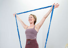Load image into Gallery viewer, resistance exercise band - blue - in use