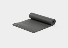 Load image into Gallery viewer, Rolled black mini Pilates mat.