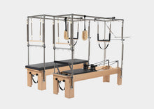 Load image into Gallery viewer, Image showcasing the combination of a Pilates Reformer and Trapeze setup.