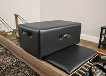 Load image into Gallery viewer, Black New York Sitting Box on a Pilates Reformer.