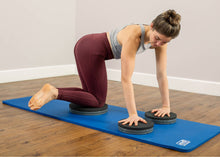 Load image into Gallery viewer, Woman doing All Fours Lateral Flexion on blue Sissel gym mat.