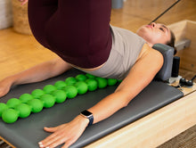 Load image into Gallery viewer, Woman using Back Stretcher Device Sissel Spinefitter