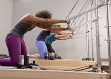 Load image into Gallery viewer, Tower Retrofit Kit for Studio Reformer and Clinical Reformer in-use photo