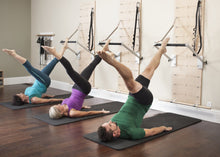Load image into Gallery viewer, Balanced Body® Push-Through Bar for Springboard in-use close-up photo