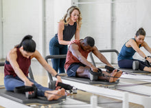 Load image into Gallery viewer, Working out on Allegro 2 Reformer