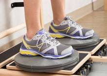 Load image into Gallery viewer, Precision Rotator Discs for CoreAlign, in-use close-up product photo. Level up your exercises!
