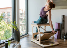 Load image into Gallery viewer, Student working out on EXO Chair