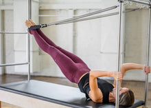 Load image into Gallery viewer, Balanced Body Trapeze Springs in-use photo
