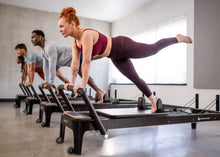 Load image into Gallery viewer, Anniversary Allegro® 2 Reformer in use - class
