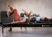 Load image into Gallery viewer, Padded Jumpboard for Anniversary Allegro® 2 Reformer in use
