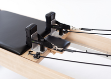 Load image into Gallery viewer, Fully-equipped Pilates Studio Reformer.
