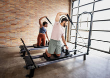 Load image into Gallery viewer, Allegro Nextgen Reformer™ with Tower and Mat in use
