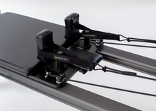 Load image into Gallery viewer, Allegro Reformer with Tower and Mat, with focus on Balanced Body handles.
