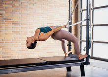 Load image into Gallery viewer, Allegro Nextgen Reformer Tower and Mat Retrofit Kit in use
