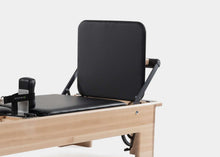 Load image into Gallery viewer, pilates studio reformer with padded jumpboard| caption::Revo Footbar
