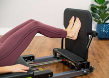 Load image into Gallery viewer, padded jumpboard - metro iq reformer - installed - exercising
