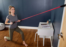 Load image into Gallery viewer, Resistance band door anchor in use 
