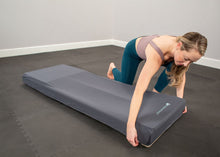Load image into Gallery viewer, Pilates professional putting cover over CoreAlign
