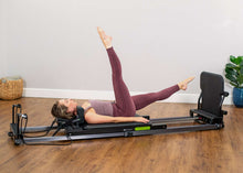 Load image into Gallery viewer, padded jumpboard - metro iq reformer - installed - pilates session
