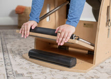 Load image into Gallery viewer, Wunda Pedal Stopper installed on wunda chair - in use
