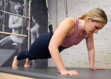 Load image into Gallery viewer, Balanced Body Trapeze Stability Sling in use
