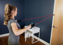 Load image into Gallery viewer, Resistance band door anchor in use 
