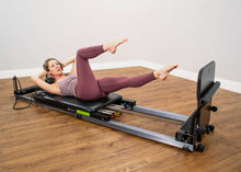 Load image into Gallery viewer, padded jumpboard - metro iq reformer - in use
