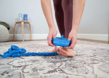 Load image into Gallery viewer, resistance exercise band - blue - in use
