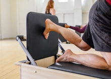 Load image into Gallery viewer, pilates studio reformer with padded jumpboard| caption::Revo Footbar
