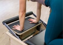 Load image into Gallery viewer, Oversized Standing Platform for Studio Reformer in use
