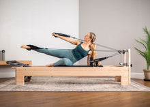 Load image into Gallery viewer, Konnector for Studio Reformer in use|caption::Reformer sold separately
