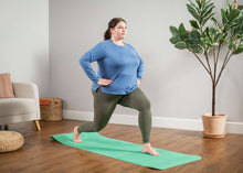 Load image into Gallery viewer, Women doing mat Pilates at home on a green Ecowise flat mat
