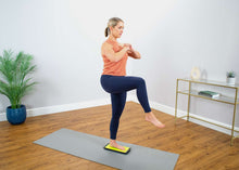 Load image into Gallery viewer, Woman using Naboso Kinesis Board

