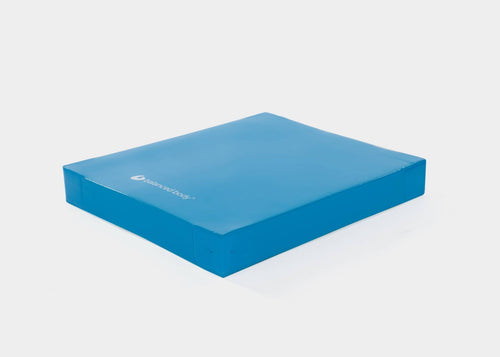 Blue Balance Pad by Balanced Body for stability training.