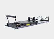 Load image into Gallery viewer, Metro-IQ Pilates Reformer for a comprehensive workout.
