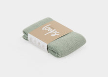 Load image into Gallery viewer, Light mint-colored resistance bands.
