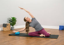 Load image into Gallery viewer, Woman using Eric Franklin air ball for hand exercises.
