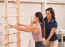 Load image into Gallery viewer, Student working out on CoreAlign Wall Mounter Ladder
