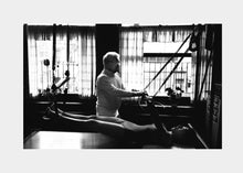 Load image into Gallery viewer, Vintage photo of Joseph Pilates instructing a student. | caption::The Cadillac
