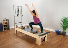 Load image into Gallery viewer, Add variety to your workouts with this versatile, drop-in accessory for your Studio Reformer
