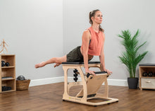 Load image into Gallery viewer, Student working out on CenterLine Chair
