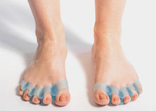 Load image into Gallery viewer, Close-up view of two legs with toes splayed, each featuring Naboso Splay technology for foot health.
